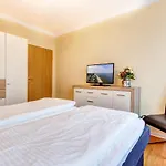 Am Schloonsee Haus D - Mit Strandkorb